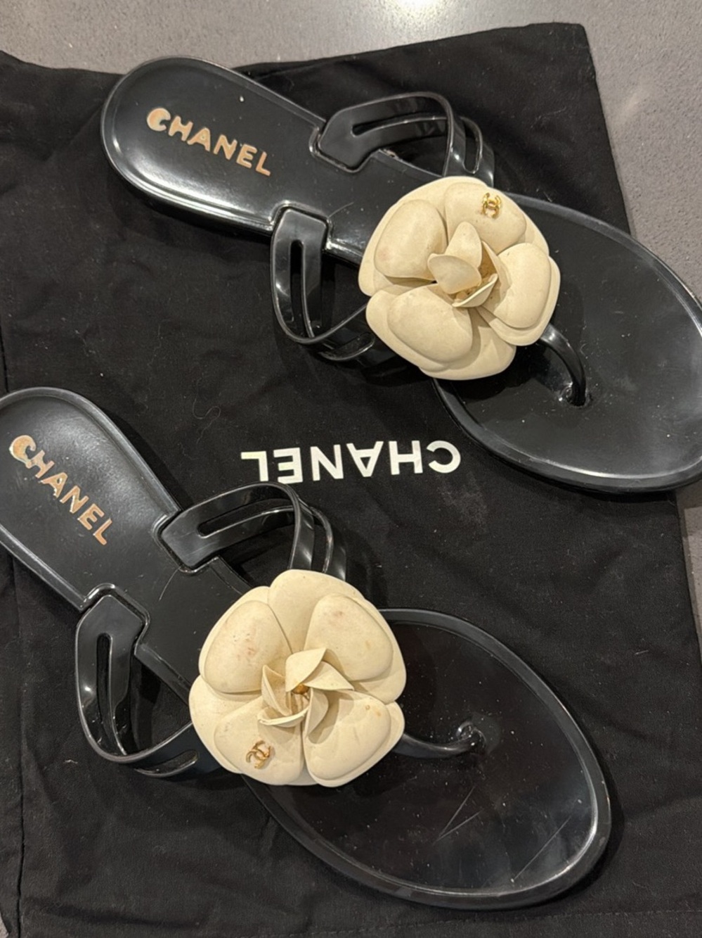 CHANEL Black Jelly Thong Sandals with Beige Camellia Flower